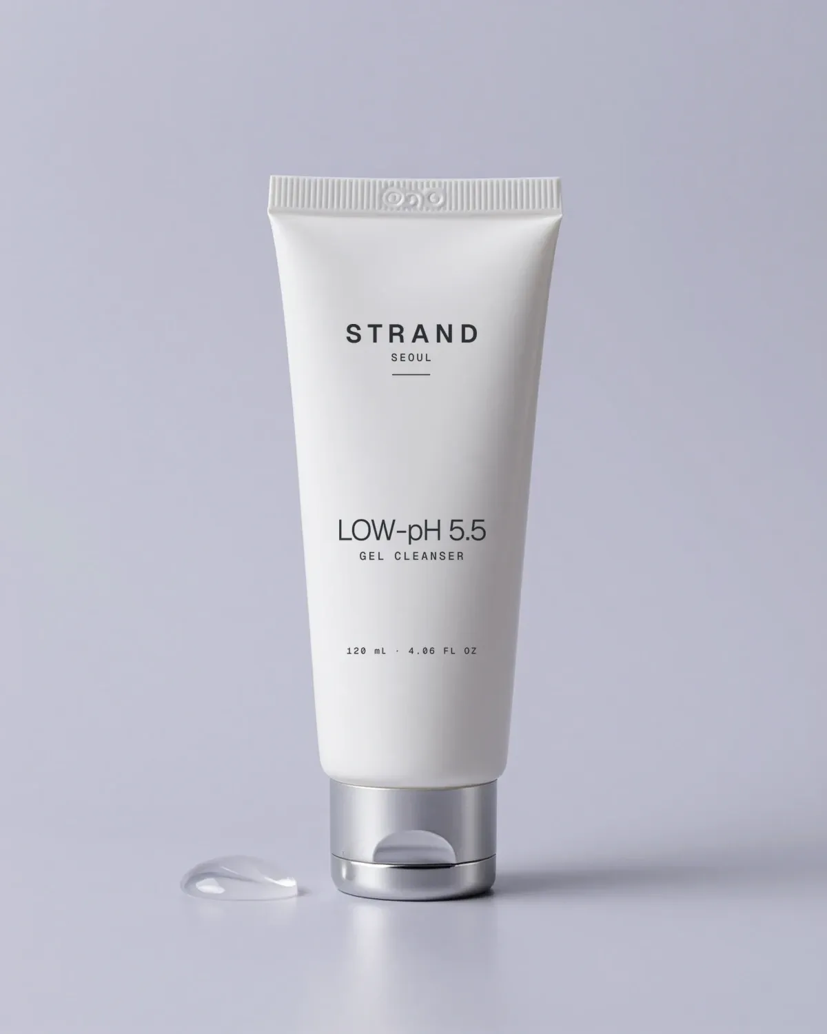 Low-pH Gel Cleanser: a soft white tube with a silver cap