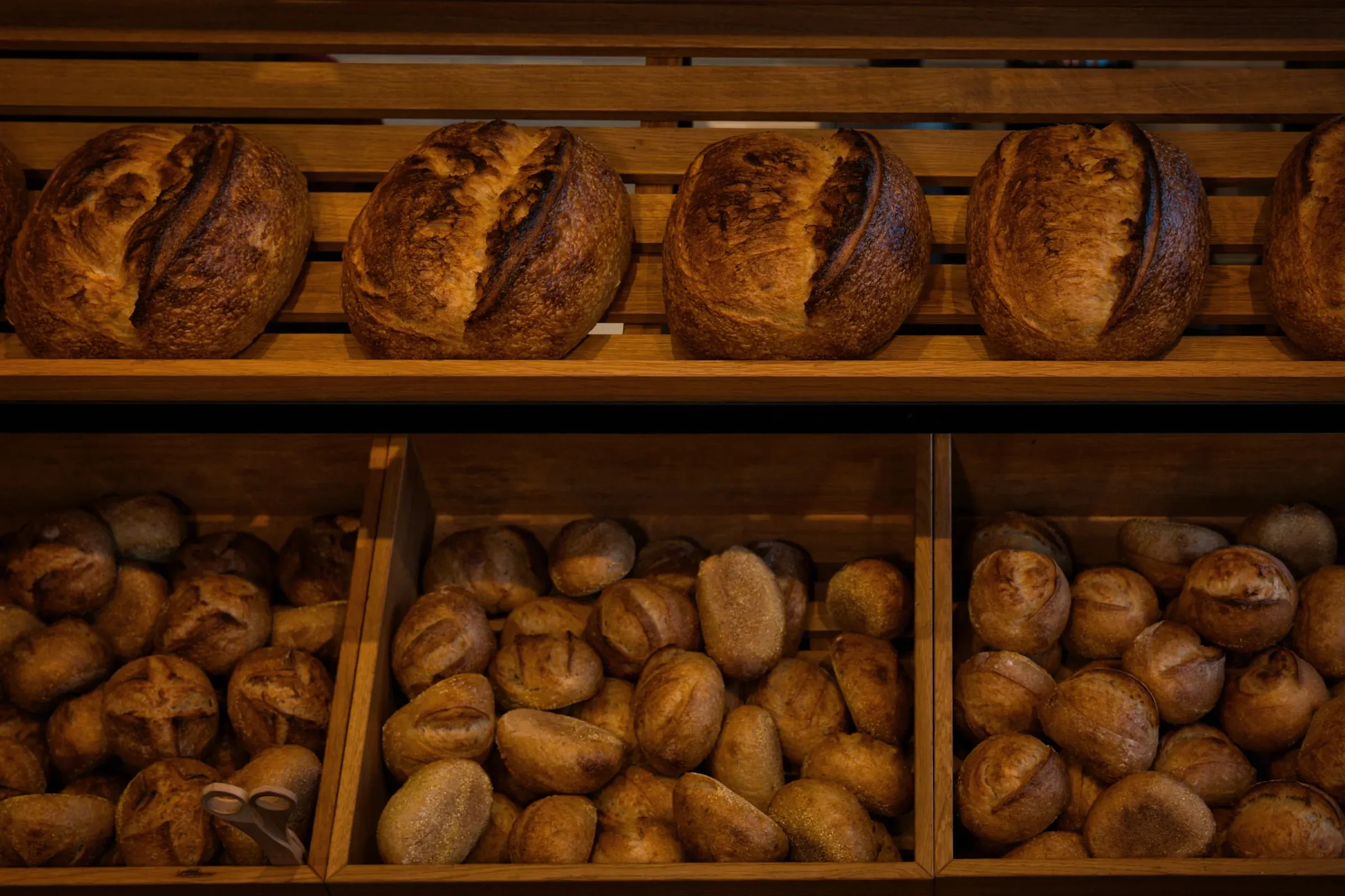 Shelves of the day’s loaves at the Culver City bakehouse