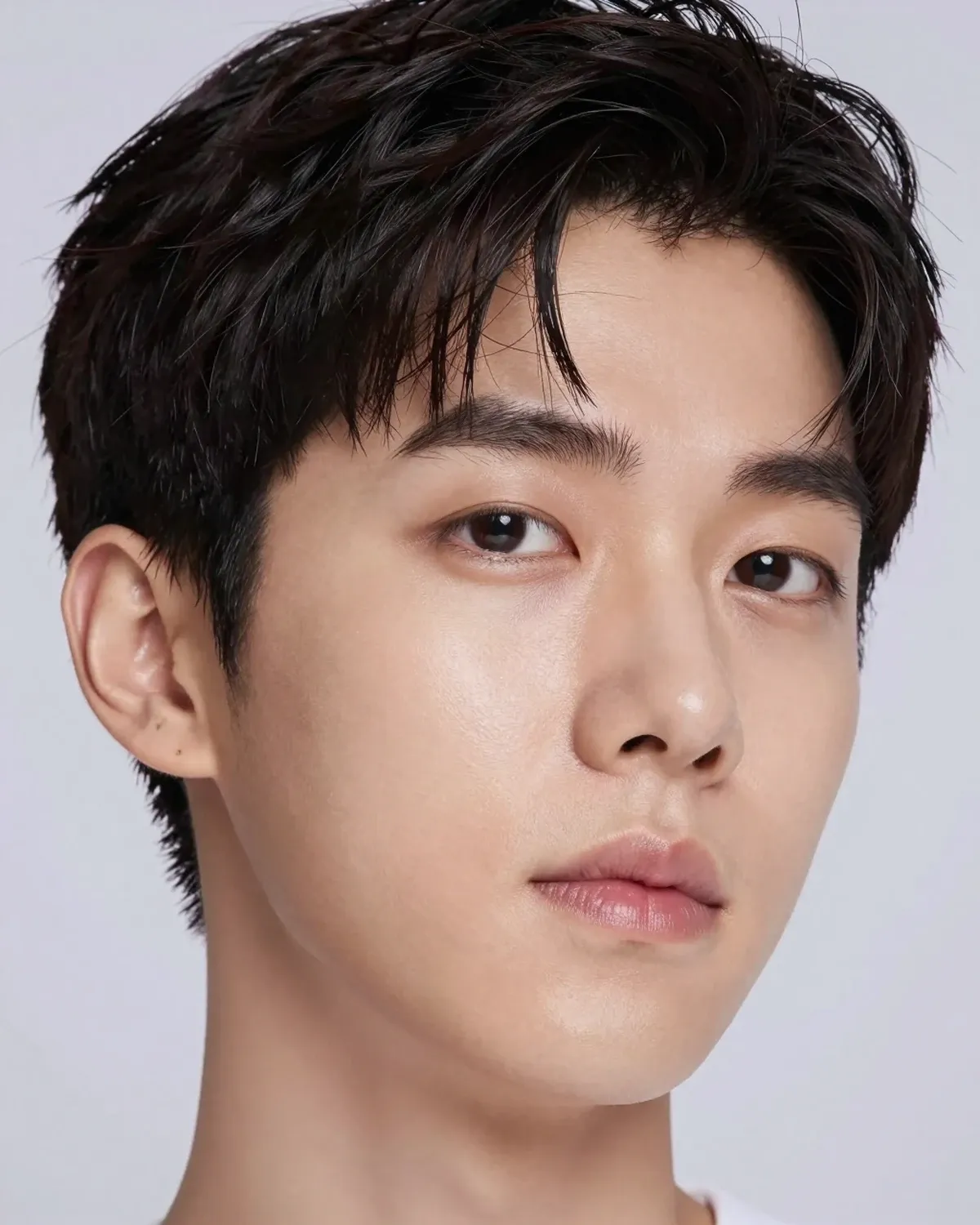Portrait of a man with clear, healthy-looking skin