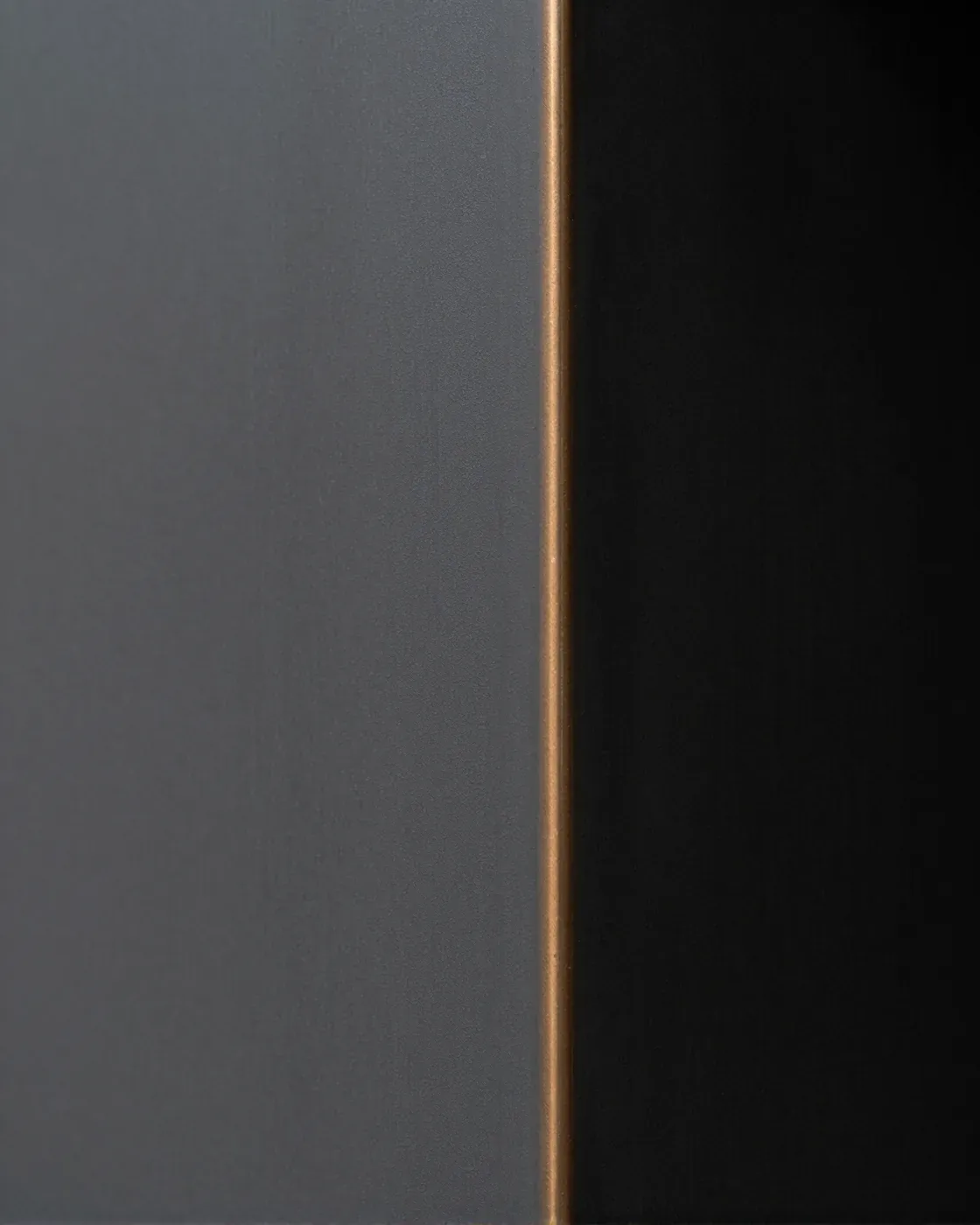 Metal sample: blackened steel, folded thin, left to patina