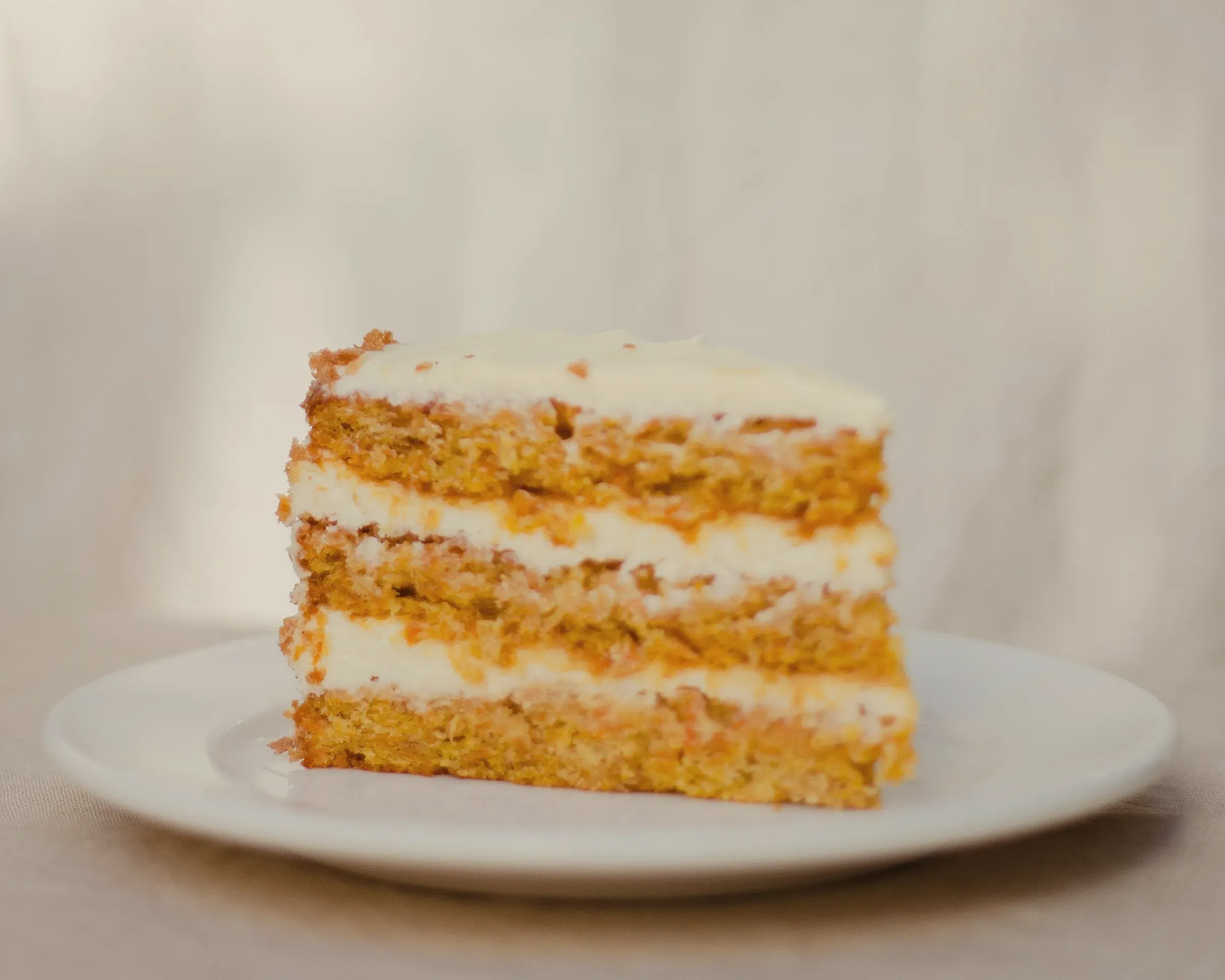 A slice of honey layer cake with thin golden layers